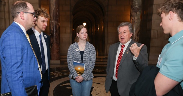 Sen. Stan Clouse of Kearney, second from right, meets with UNK students Wednesday during the annual “I Love NU” Day event at the State Capitol in Lincoln. (Photo by Erika Pritchard, UNK Communications)