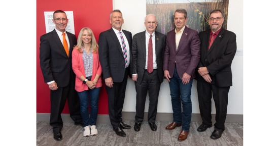 (Pictured Left to Right:  DHHS CEO Steve Corsi; Becky Gilbert, Manager of the Monroe-Meyer IT team;  Steve Green, Deveopmental Disabilities Director for DHHS; UNMC Chancellor Jeffrey Gold; Gov. Jim Pillen; Dr. Karoly Mirnics, director of the Monroe-Meyer Institute)