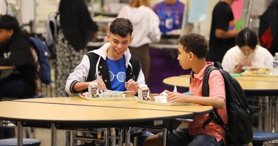 Students enjoying a school meal at CPI